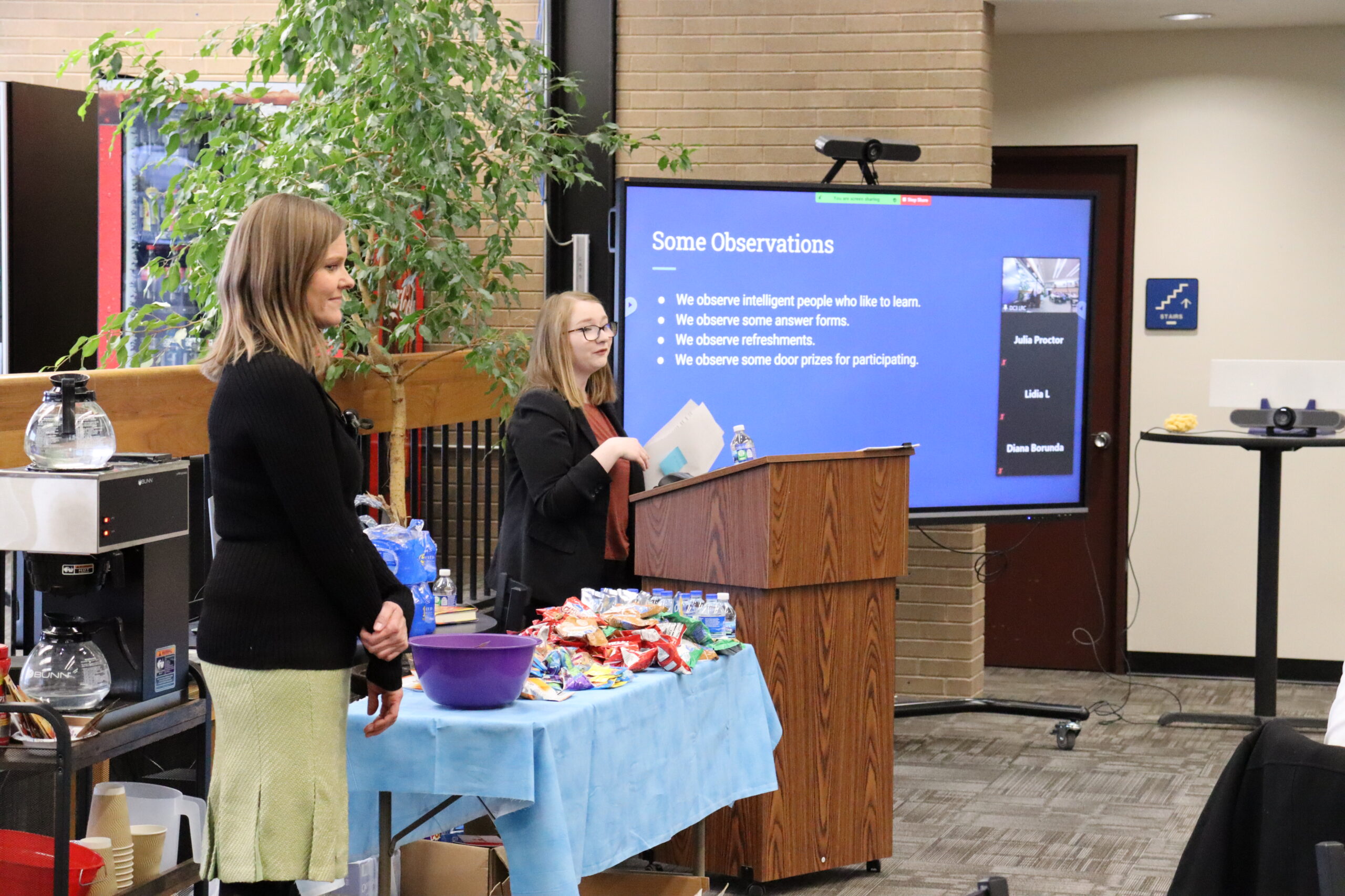 At the most recent Science Café, on March 10, Dr. Monica Cook (left), DC3 Associate Professor of Biology, gave a presentation on marine science. Also pictured is Julia Proctor, DC3 Instruction and Collection Librarian. [Photo by Luke Fay]